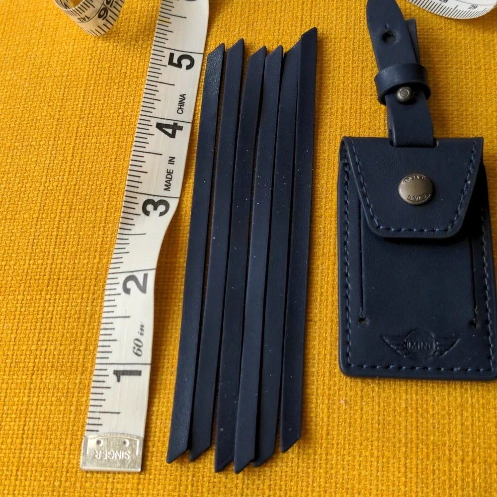 Tumi/Mini Cooper limited Edition collab luggage tag & Leather zipper pulls NEW